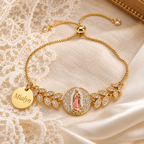 Gold Mother Mary bracelet with adjustable pull string and personalized round name charm on cream lace